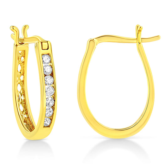 Yellow metal hoop earrings with channel-set round white gemstones on one side, shown from the front and back angles.