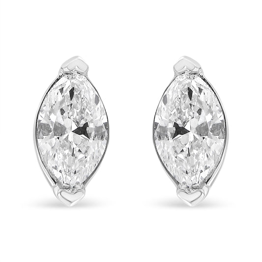 Front-facing pair of white metal marquise shaped earrings with white gemstones in prong settings.