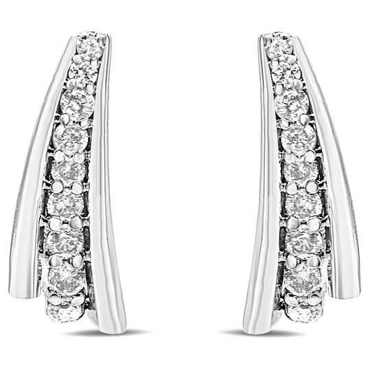 Pair of white metal earrings with curved design, each featuring a row of round white gemstones in prong settings, shown from the front angle.