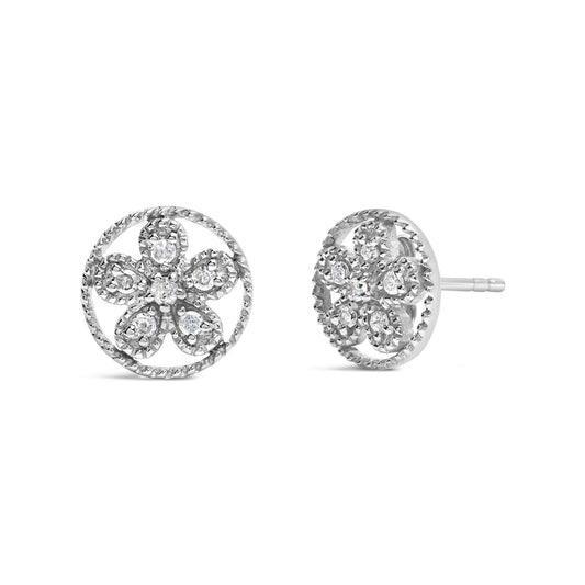 Front and side views of round white metal stud earrings with flower shaped arrangement of white gemstones in prong setting.