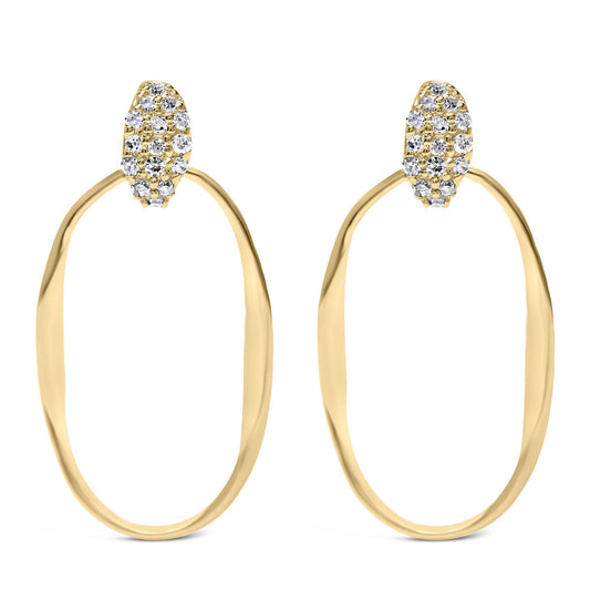 Front view of yellow metal open oval hoop earrings with pavé set white round gemstones on the top section.
