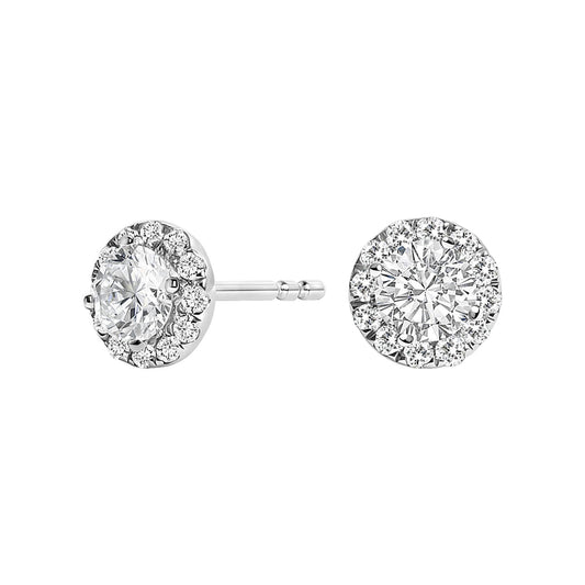 Front and side view of white metal stud earrings featuring a central round white gemstone surrounded by a halo of smaller round white gemstones.