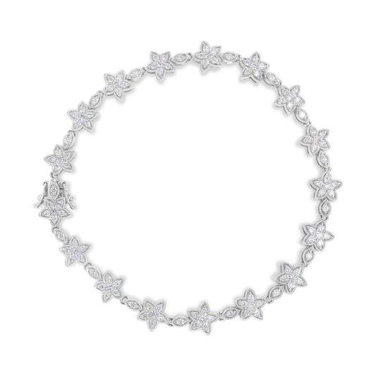 Top-down view of a white metal bracelet featuring alternating flower and marquise-shaped links, each adorned with white round gemstone prong settings.