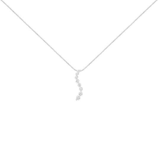 White metal necklace with a vertical curved pendant featuring round prong-set brownish gemstones, shown from front angle.