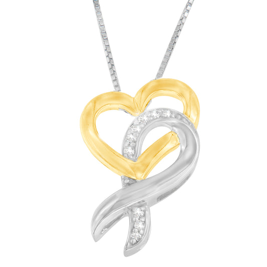 Front angled view of a two-toned necklace pendant combining a gold heart shape with an intertwined silver ribbon accented with round white gemstones in a prong setting.