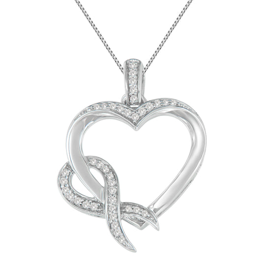 Front-facing close-up of a white metal heart-shaped necklace pendant with intertwined design, adorned with round white gemstones in prong settings.