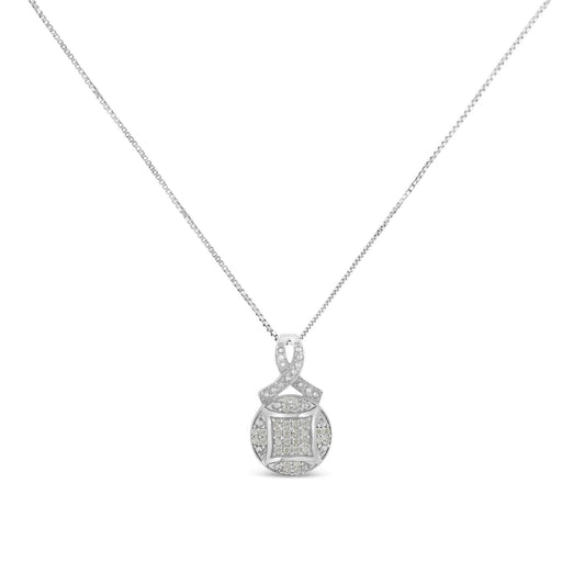Front view of a white metal necklace with a round pendant featuring an intricate design set with white round pave-set gemstones.