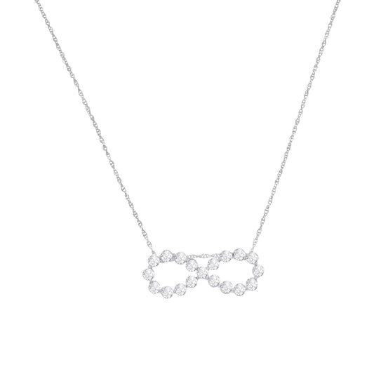 Front view of a white metal necklace with a pendant featuring two interlocking circles made of round white gemstones in miracle setting.