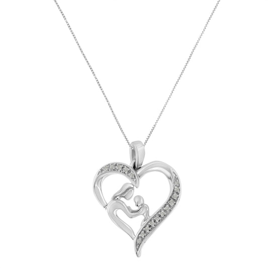 Front-facing shot of a white metal heart-shaped necklace pendant with an abstract mother and child design, accented with round prong-set white gemstones along the heart outline.