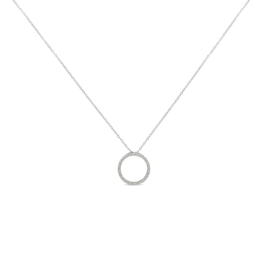 Front view of a white metal necklace with a circular pendant featuring round white gemstones in a pave setting.