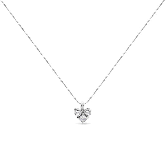 Front view of a white metal necklace with a pendant featuring one princess shape white gemstone and two round shape white gemstones in prong settings.