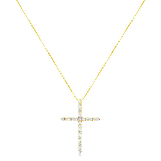 Front-facing view of a yellow metal necklace with a cross-shaped pendant adorned with round white gemstones in prong settings.