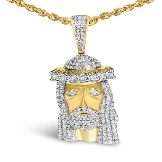 Close-up front view of a yellow metal necklace with a pendant shaped like a face, featuring white round pave-set gemstones outlining the hair, eyes, and crown, showcasing intricate gemstone detailing.