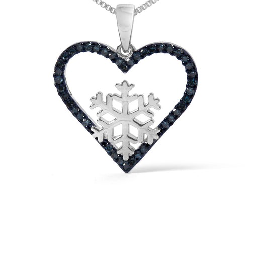 Close-up front view of a white necklace pendant featuring a heart outline adorned with round blue gemstones in prong settings and a snowflake design in the center.