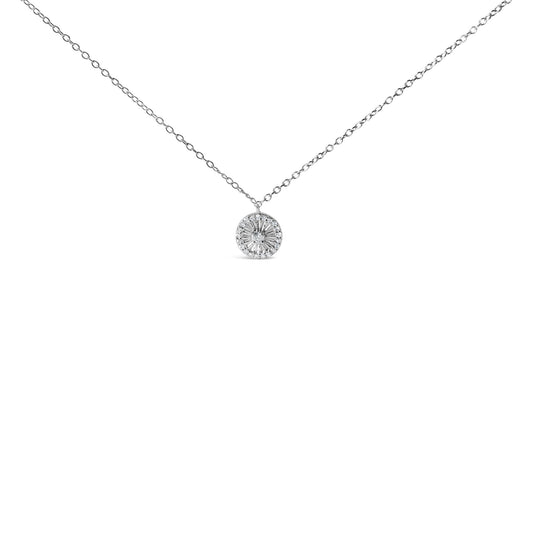 Front-facing shot of a white metal necklace with a round pendant featuring one central white gemstone surrounded by multiple white gemstones in a prong setting.