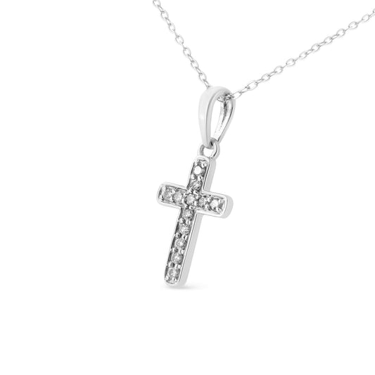 White metal necklace with a cross pendant set with round white gemstones in prong settings, shown at a slight angle against a white background.