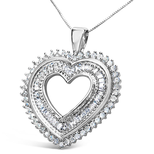 Close-up front angle of a white metal heart-shaped necklace pendant with two rows of white round prong-set gemstones surrounding a row of white baguette channel-set gemstones in the center.