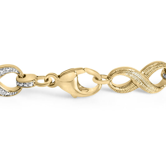 Close-up front angle of a yellow metal bracelet with interlocking links, some adorned with pavé-set white round gemstones, shown on a white background.