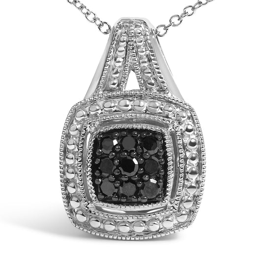 Close-up front view of a white necklace pendant featuring a square cluster of black gemstones surrounded by raised beaded detailing and pavé-set round black gemstones.