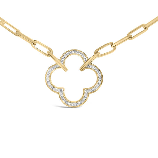 Close-up front view of a yellow metal necklace with a chain link and a clover-shaped pendant outlined with white gemstones in pave setting.