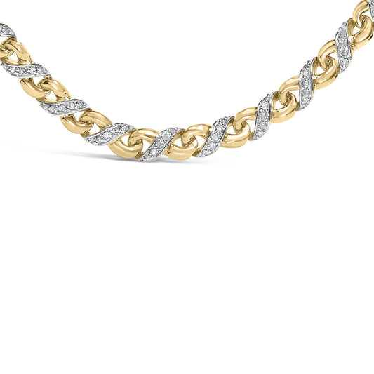 Close-up front angle of a yellow metal necklace with alternating smooth links and links wrapped in white gemstones in a prong setting.