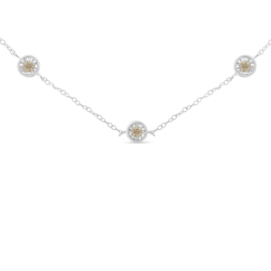 White metal necklace with round white gemstones in miracle settings, photographed from the front on a white background.