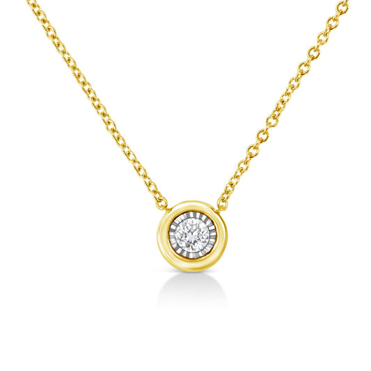 Close-up front view of a yellow metal necklace with a round brownish gemstone set in a miracle setting, centered on a chain.