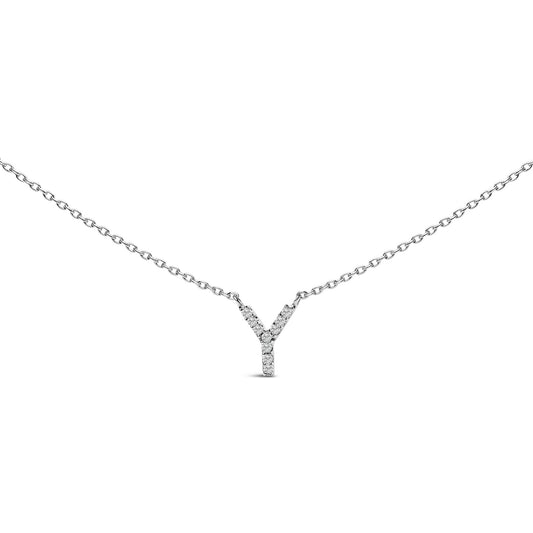 Close-up front angle of a white necklace with a Y-shaped pendant adorned with small round white gemstones in a micro-pave setting shown on a white background.