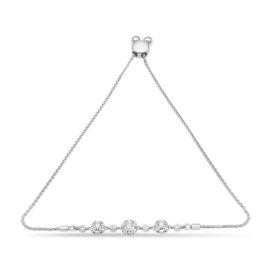 White metal bracelet with round white gemstones in prong settings, shown in a flat lay front angle.