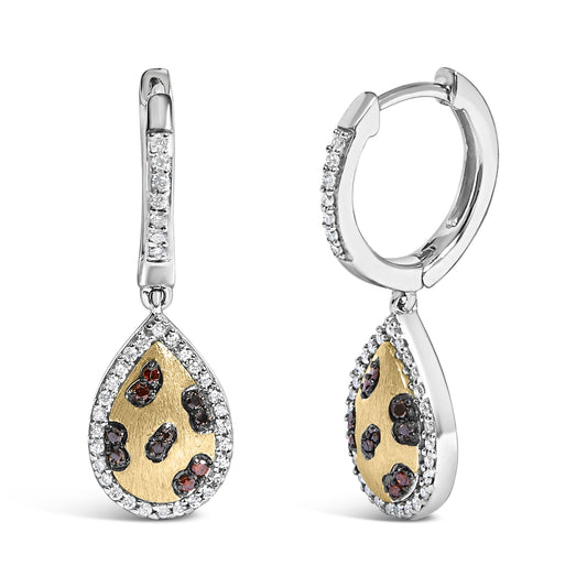 Close-up front and side view of yellow and white metal drop earrings with teardrop shapes decorated with orange and blue round gemstones set in prongs, surrounded by a border of white round gemstones in shared prong settings.