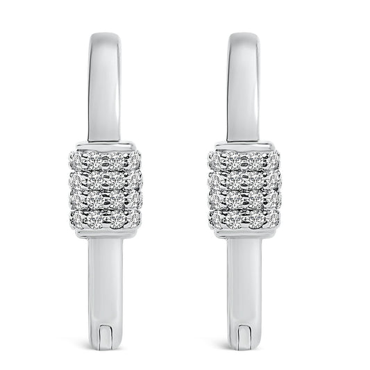 Front view of a pair of white metal earrings with a rectangular cluster of round white gemstones set in shared prong setting.