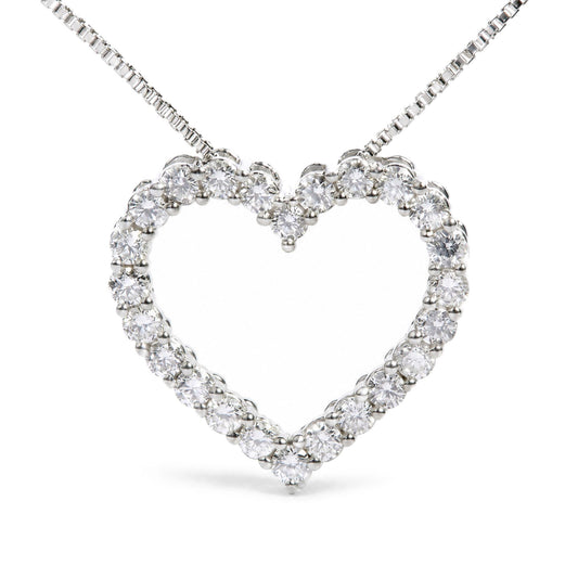 Close-up front view of a white metal heart-shaped necklace pendant adorned with round white gemstones in prong settings.