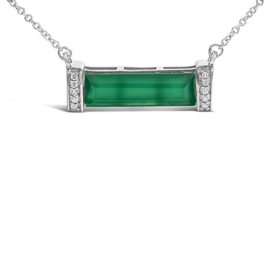 Front view of a white metal necklace with a horizontal rectangular green gemstone in a channel setting, flanked by two vertical sections with small round white gemstones in a pave setting, shown on a white background.