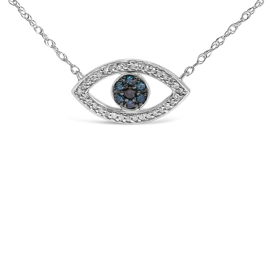 Close-up front view of a white metal eye-shaped necklace pendant with blue round gemstones in shared prong setting at the center and surrounded by white round gemstones in prong setting, shown against a white background.