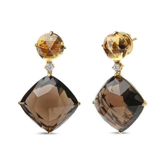 Pair of yellow metal earrings with a front-facing round yellow gemstone at the top, a small white round gemstone below it, and a large faceted cushion-shaped smoky gemstone dangling beneath, shown from a slightly angled front view.