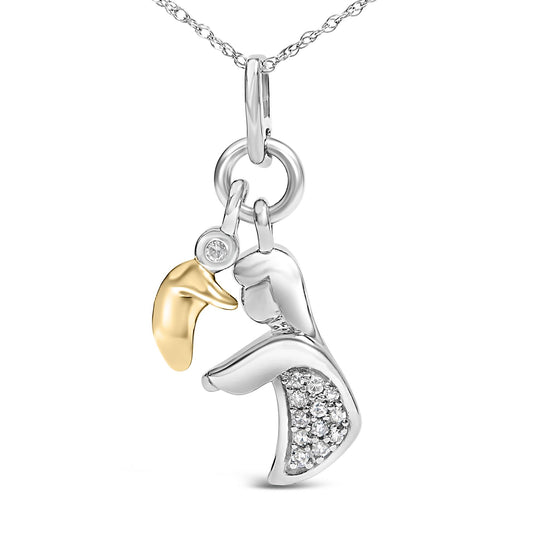 Close-up image of a two-tone necklace pendant featuring a yellow metal bird shape with a single white round gemstone in bezel setting as the eye, and a silver-toned angel figure with white round gemstones in pave setting on the wing, shown hanging straight from a chain against a white background.