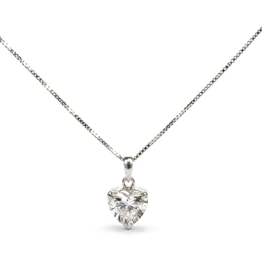Close-up front view of a white necklace with a heart-shaped white gemstone pendant in a three-prong setting.
