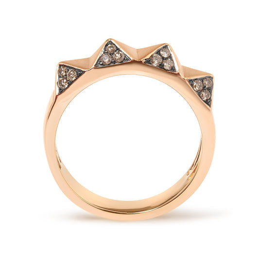 Front-facing view of a rose-colored ring with four triangular sections, each set with round brown gemstones in a pave setting.