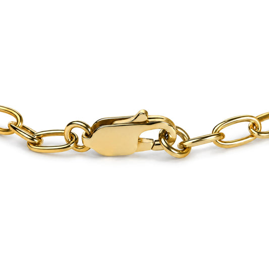 Close-up of yellow gold vermeil diamond accent open heart link bracelet showing clasp and oval links on white background
