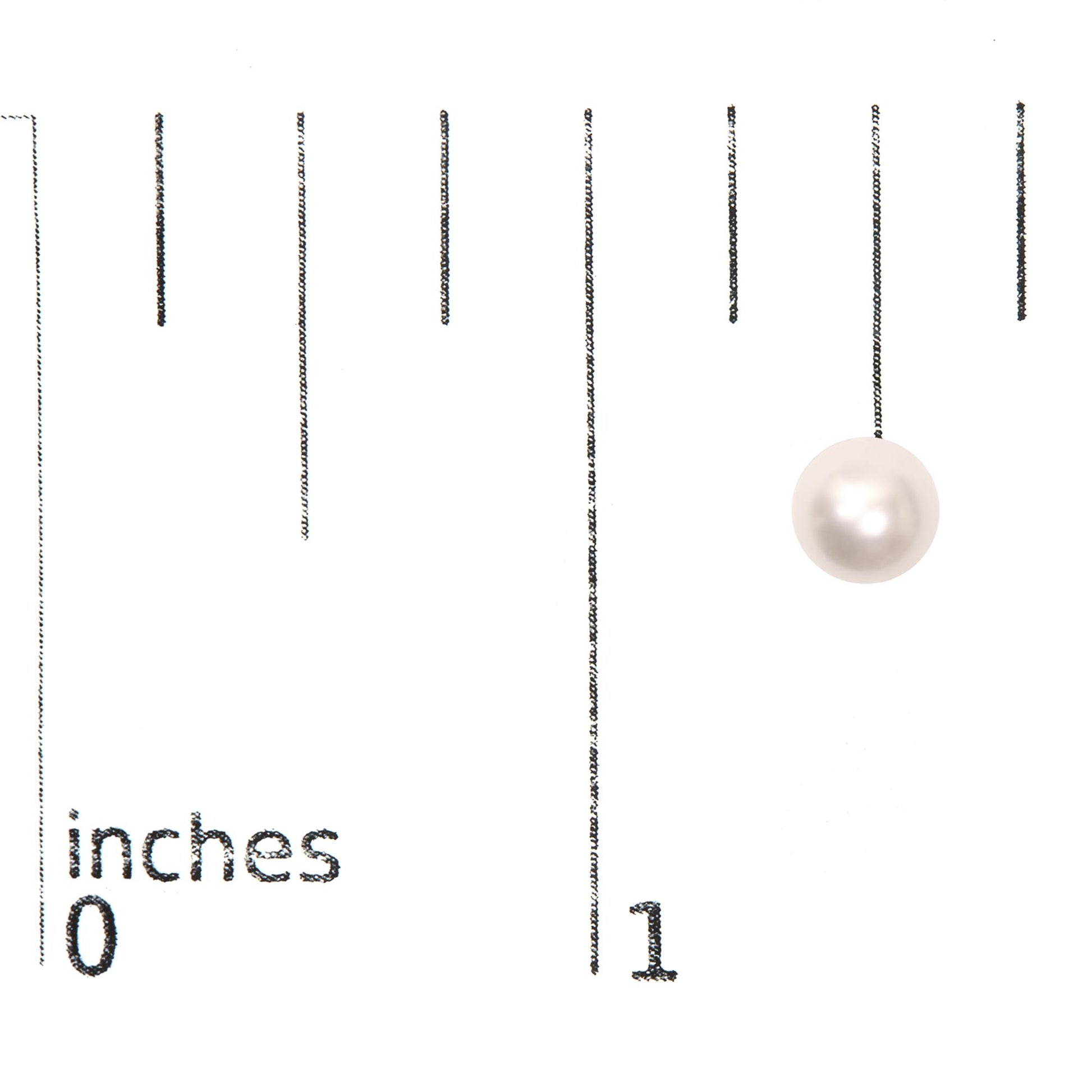White pearl stud earring shown from the front on a ruler and scale for size reference.