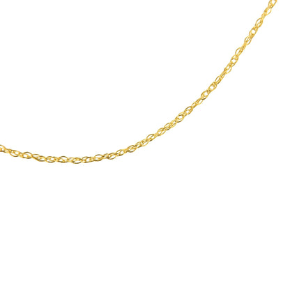 Close-up front angle of a delicate yellow metal chain with oval-shaped links against a white background.