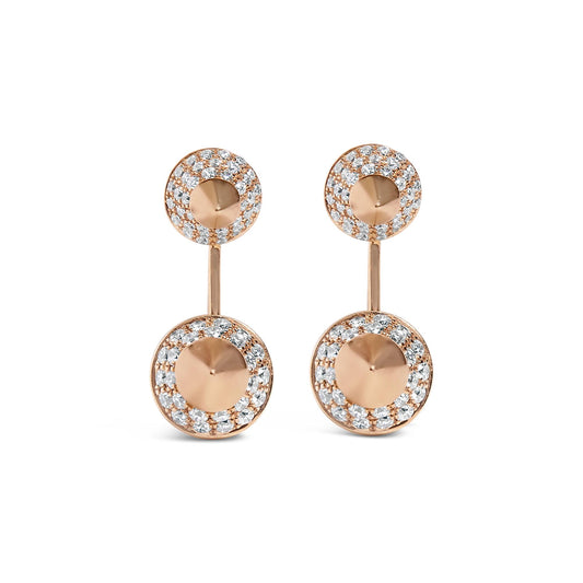 Front view of rose metal drop earrings with two circular elements each, featuring white round pave set gemstones surrounding a smooth center.