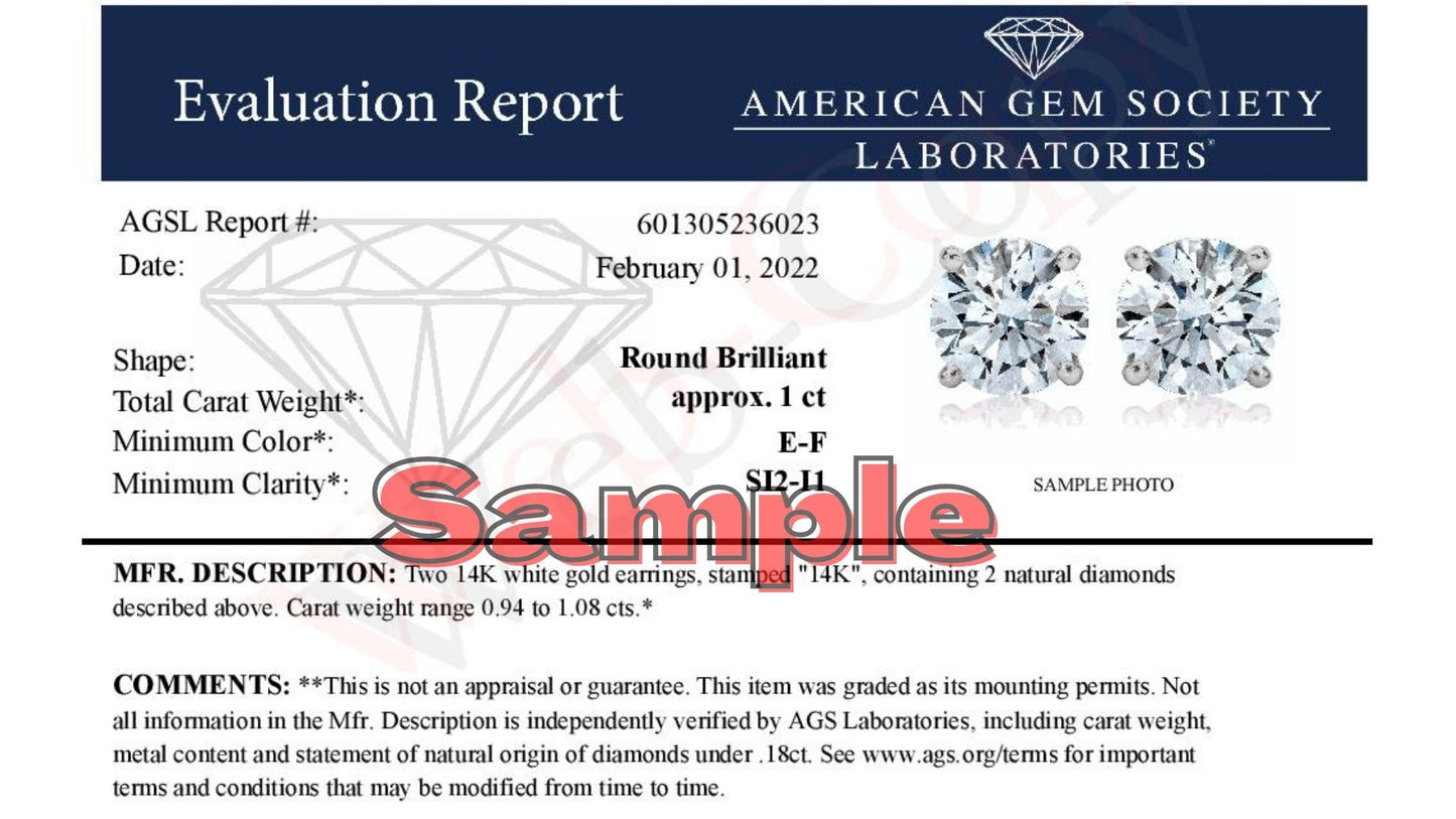 Alt text: Pair of white metal stud earrings shown from the front on a white background, each featuring a round white gemstone in a four-prong setting.