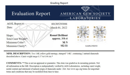 Alt text: Front-facing view of a pair of yellow metal stud earrings, each featuring a round white gemstone held by a four-prong setting, shown on a white background.