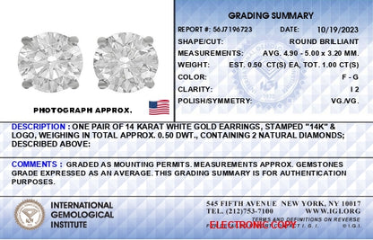 Alt text: Close-up front view of a pair of white metal stud earrings, each featuring a single round white gemstone set in a four-prong setting.