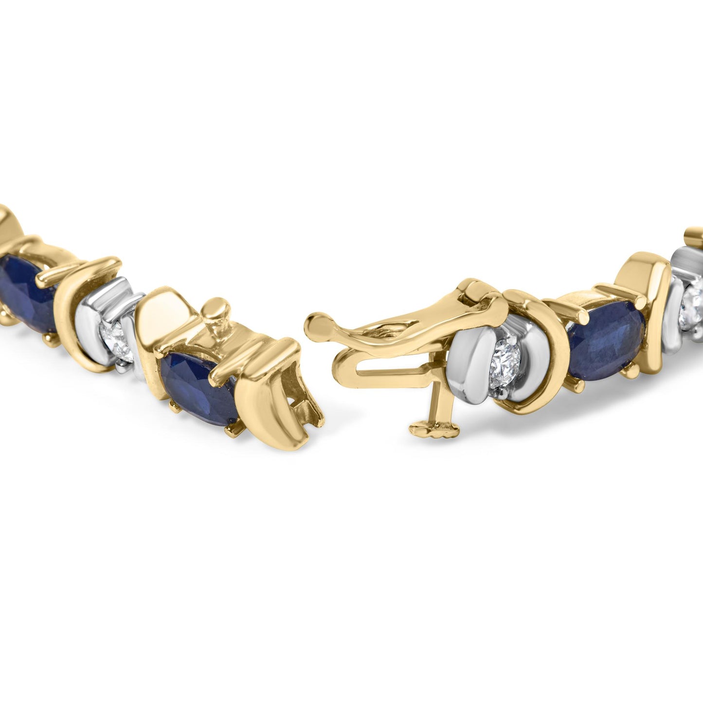 Close-up of a yellow metal bracelet with alternating oval blue gemstones in four-prong settings and round white gemstones in two-prong settings, shown partially open from a front angle.