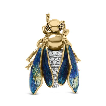 Front-facing close-up of a yellow metal insect-shaped brooch with iridescent blue wings and white round prong-set gemstones on the body and black dots on the eyes.