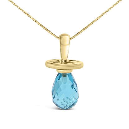 Front view of yellow metal necklace with a round disc and a single faceted blue gemstone pendant in a drilled setting.