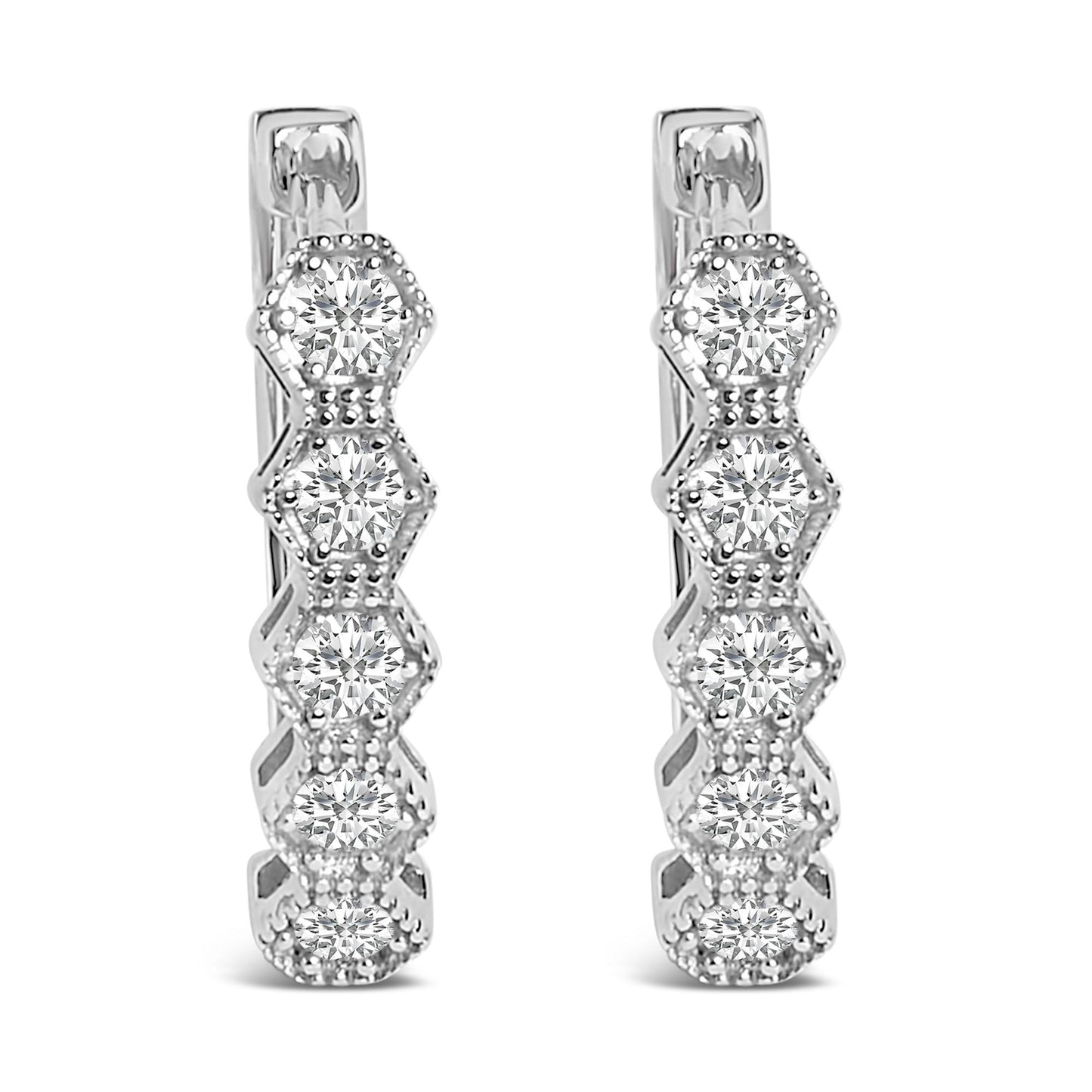 Pair of white metal hoop earrings with round white gemstones in six-prong settings, shown in a front-facing close-up angle.