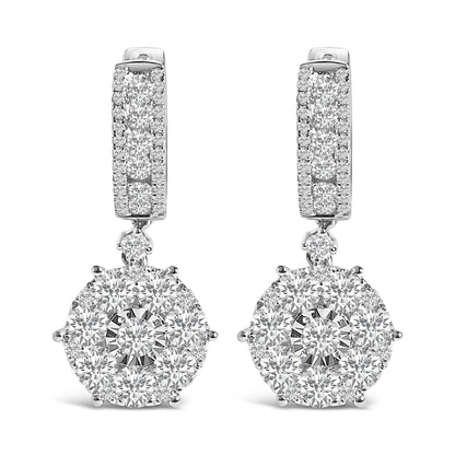 Front view of a pair of white metal drop earrings with multiple round white gemstones in various settings, featuring a rectangular upper part and a circular cluster pendant.